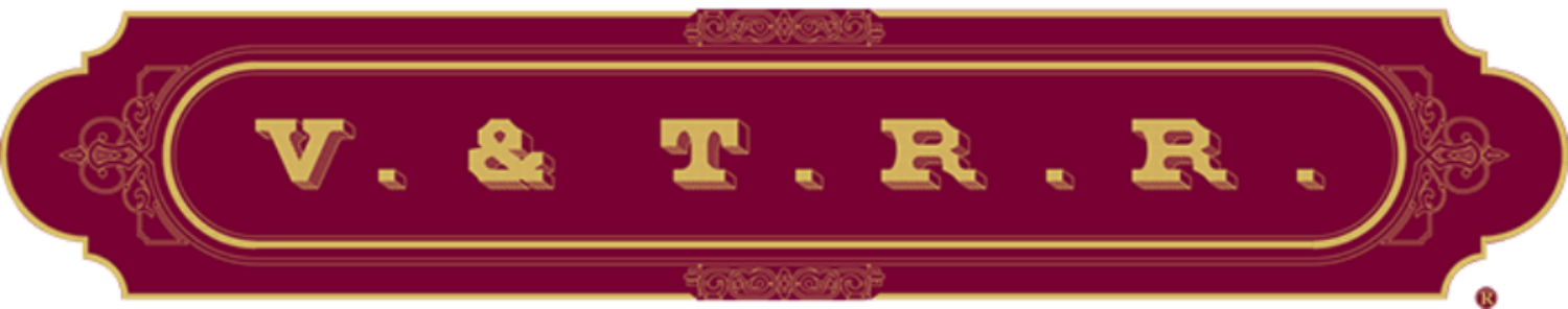 A red and gold banner with the word " t. E ".