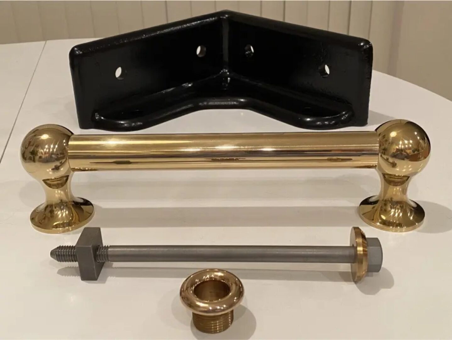 A table with some gold and black handles